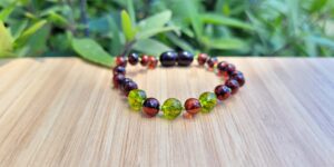 Cognac Baltic Amber with Faceted Peridot Gemstones 14.5cm Baby/Toddler Anklet